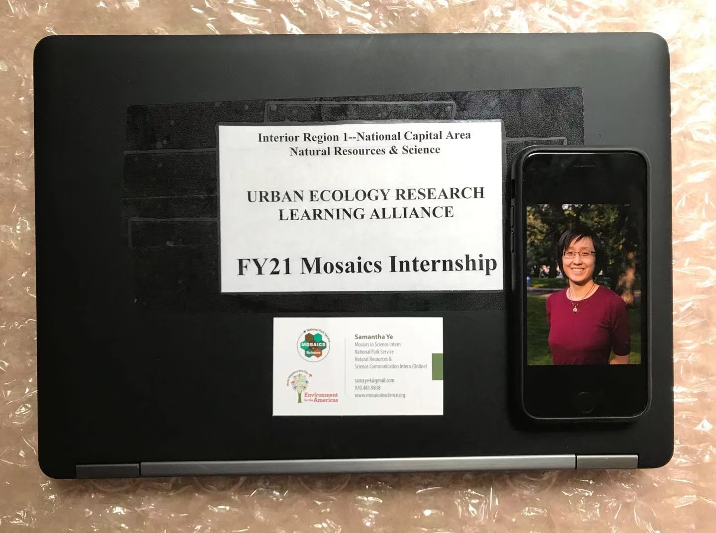 Photo of Samantha Ye on a government laptop computer